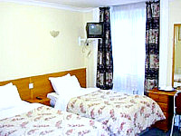 A Typical Twin Room at Belmont and Astoria Hotel