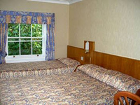 One of the triple rooms at the Orchard Hotel