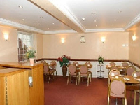 The guest dining room at the Orchard Hotel
