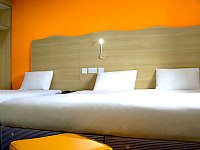 A typical triple room at Queens Hotel London