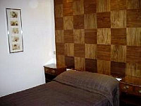 A typically simple and comfortable Single room at the Garden View Hotel