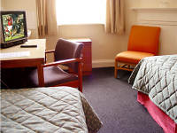 A bedroom at Grange Wellington Hotel