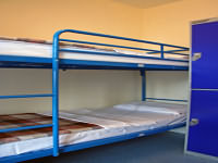 A dormitory room at Camden Inn