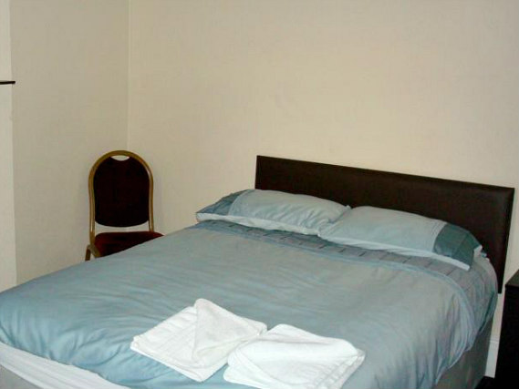Rest easy in a comfortable bed in your room at The Central