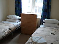 A Typical Twin Room Inside Access Apartments City