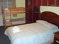 A quad room at Heathrow Lodge