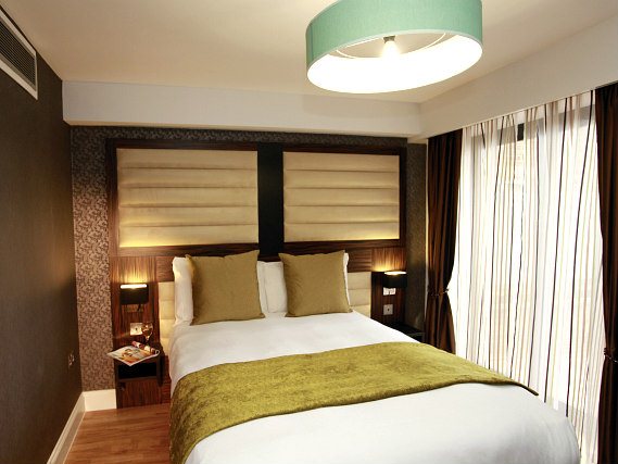 A typical double room at Best Western Maitrise Suites