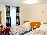 Comfortable Twin rooms at the Belmont and Astoria Hotel