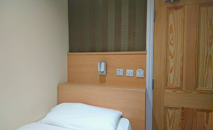 A typical single room at Mina House Hotel London