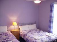 A twin room at Elena Hotel London