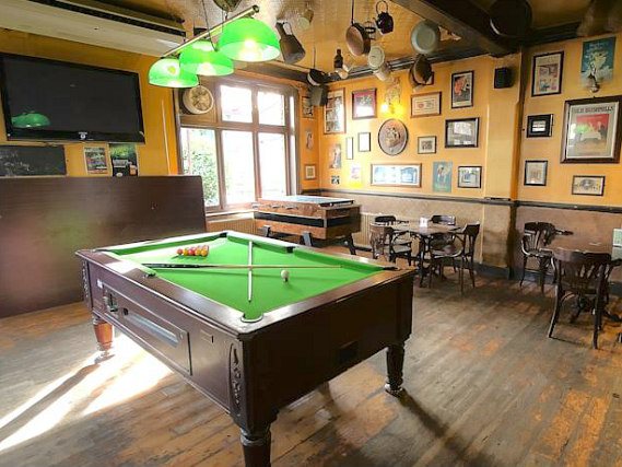 Join the locals with a game of pool