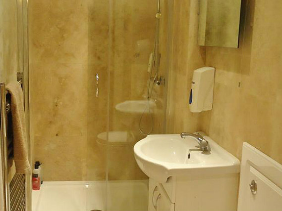 A typical bathroom at Hour Glass Hotel