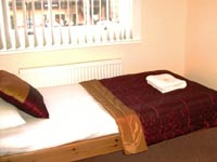 A typical single room at London House Hotel