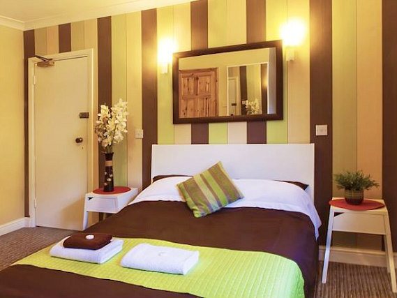 Stay in comfort at Hotel 261 in one of the grand double bedrooms