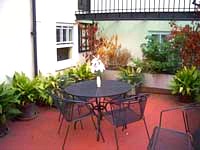 Relax outside at the Enrico Hotel