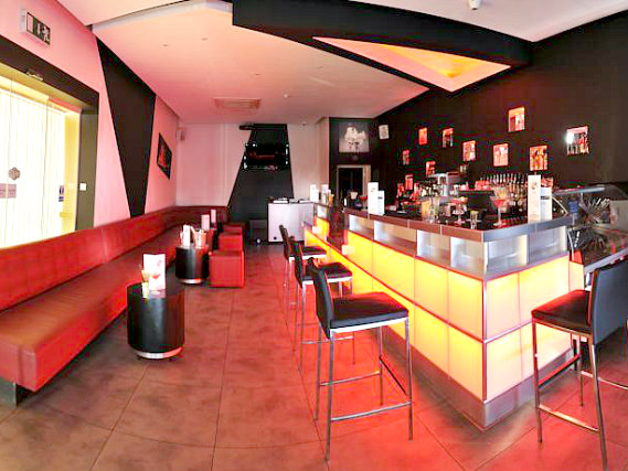 Relax in the bar at St Georgio Hotel after a busy day
