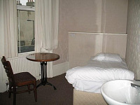 One of the single rooms at the Wishing Well Inn London