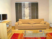 A comfortable and relaxing seating area within the Executive Apartments