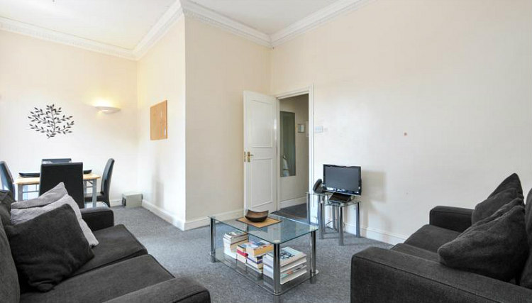 Watch TV in the lounge at Access Apartments Maida Vale South