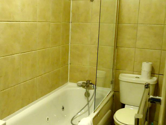 A bathroom at Access Apartments Earls Court