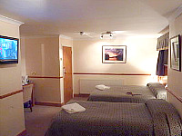 A Quad room at Heatherbank Guesthouse - All rooms come with Flat screen TV's