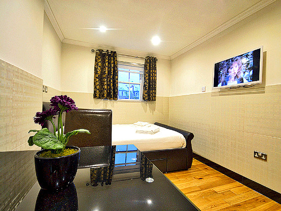 Relax in your room at Apart Hotel 73