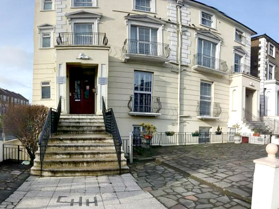 The outside of Corner House Hotel