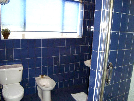 A bathroom at Best Inn Hotel