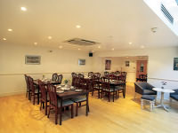 The breakfast room at Abcone Hotel London