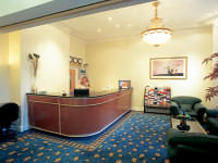 The reception area at Abcone Hotel London
