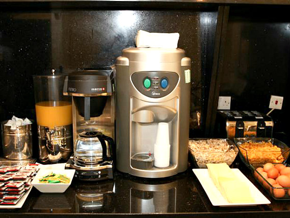 A kitchen at Holland Court Hotel