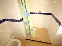 Bathrooms at Camelot House Hotel are clean and simple