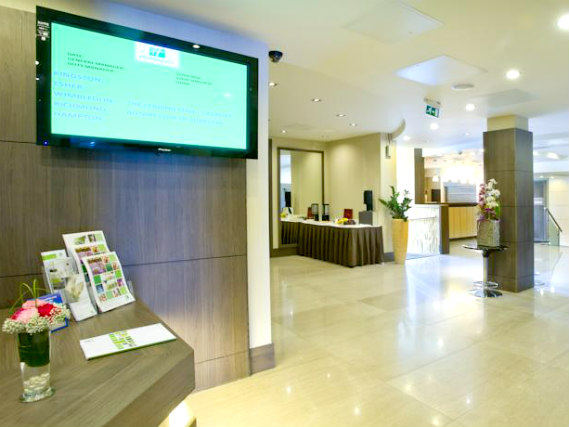 Watch TV in the lounge at Holiday Inn Express Park Royal