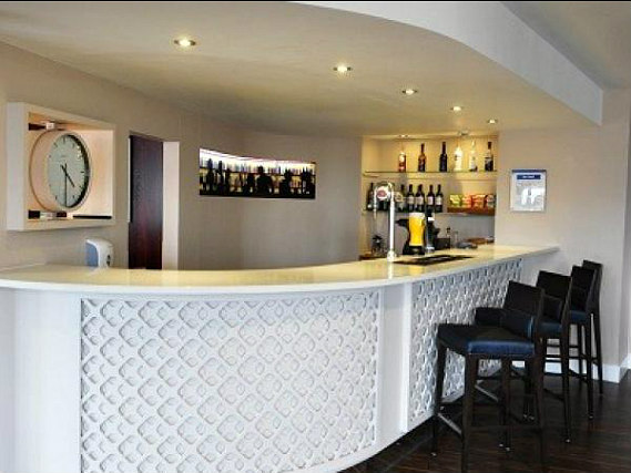 Relax in the bar at Holiday Inn Express Royal Docks after a busy day